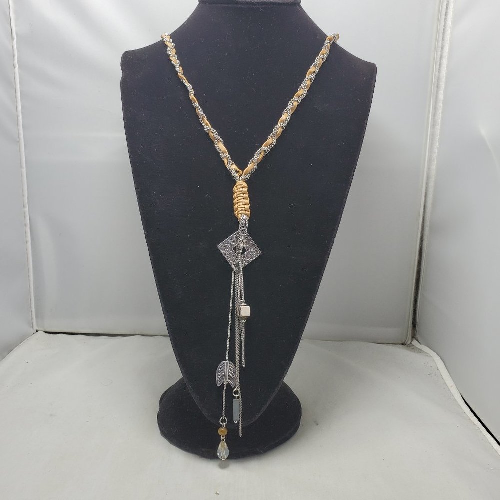 BKE tan leather with silver chain braided neck with hanging charms